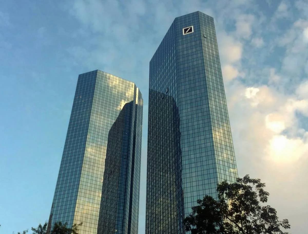 The Deutsche Bank twin towers in Frankfurt against a blue sky