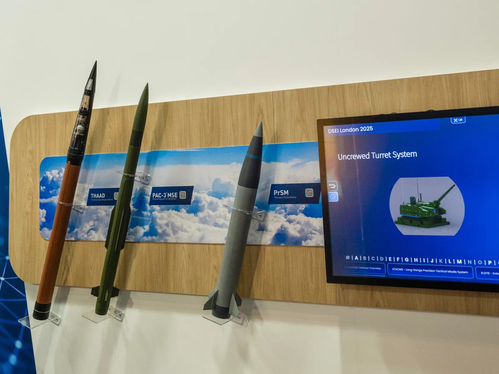 Mock-up THAAD, PAC-3 MSE and PrSM interceptor missiles on display at the DSEI London defence exhibition