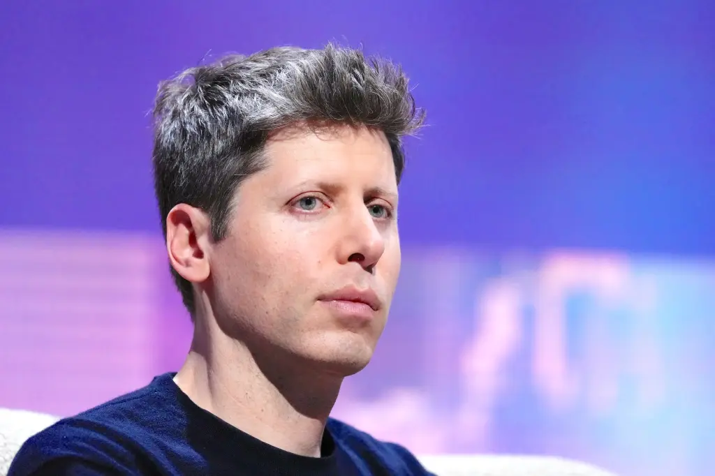 OpenAI CEO Sam Altman looks on during a panel discussion