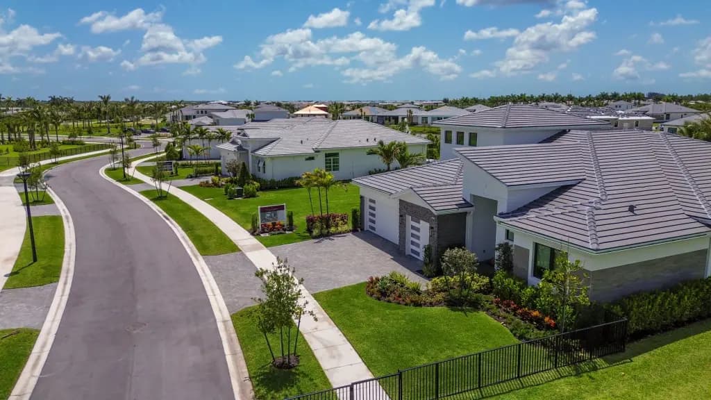 An aerial view of a suburban neighborhood with newly built houses