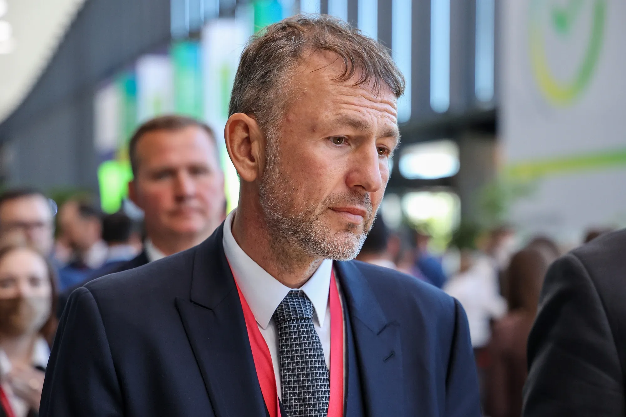 Russian aluminium magnate Oleg Deripaska photographed among delegates at an economic forum